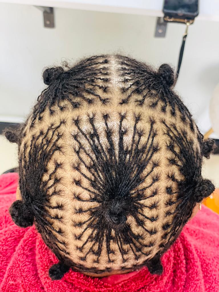 Fresh Sisterlocks installation showing precise parting