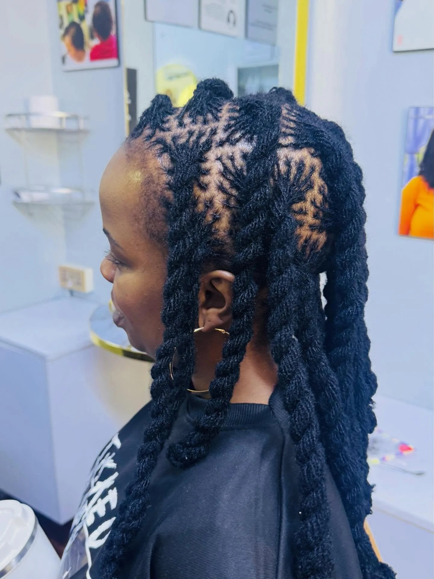 Close view of the loc technique used in Sisterlocks training